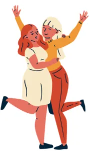 Deux amies s’enlaçant joyeusement, symbolisant le bonheur et la camaraderie.